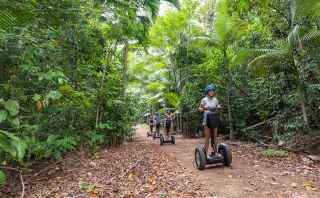 A girl riding a Segway at Conway National Park