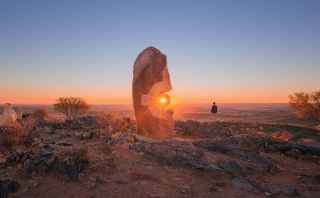 Man overlooking sunset at Broken Hill