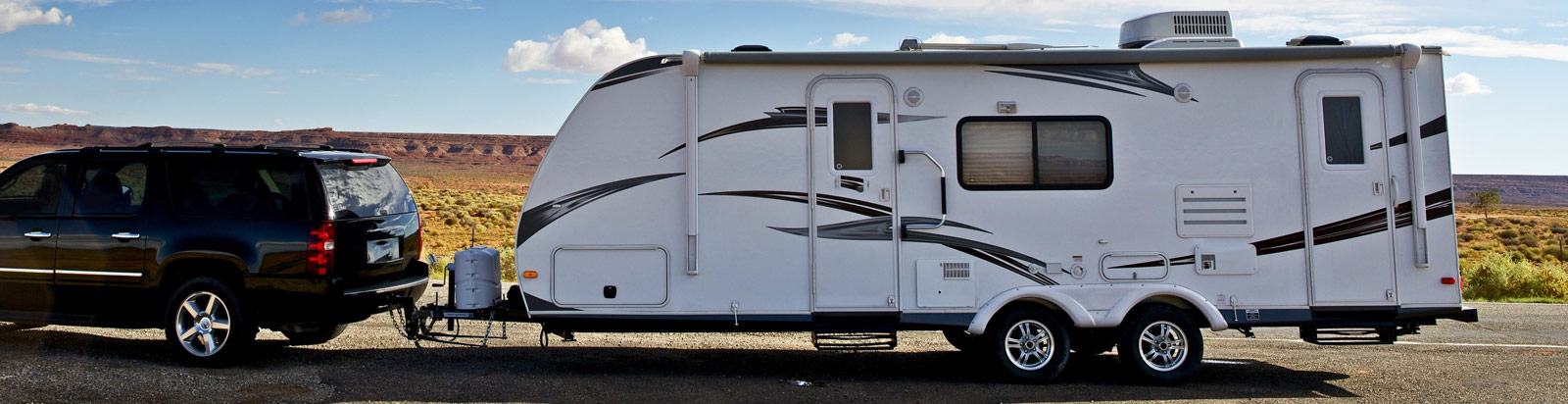 5th Wheeler trailer on a desert road